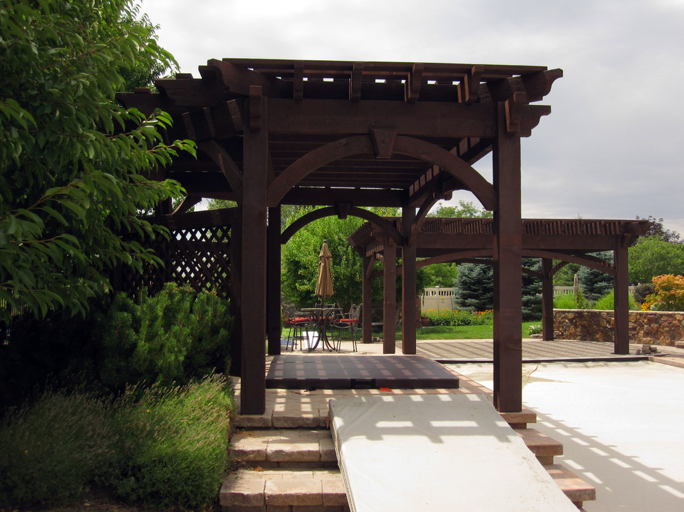 This is an example of a classic patio in Salt Lake City with a pergola.