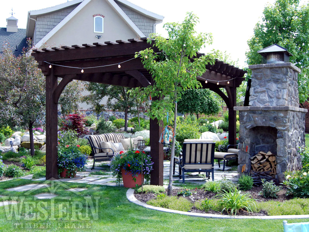 Example of a classic patio design in Salt Lake City with a pergola