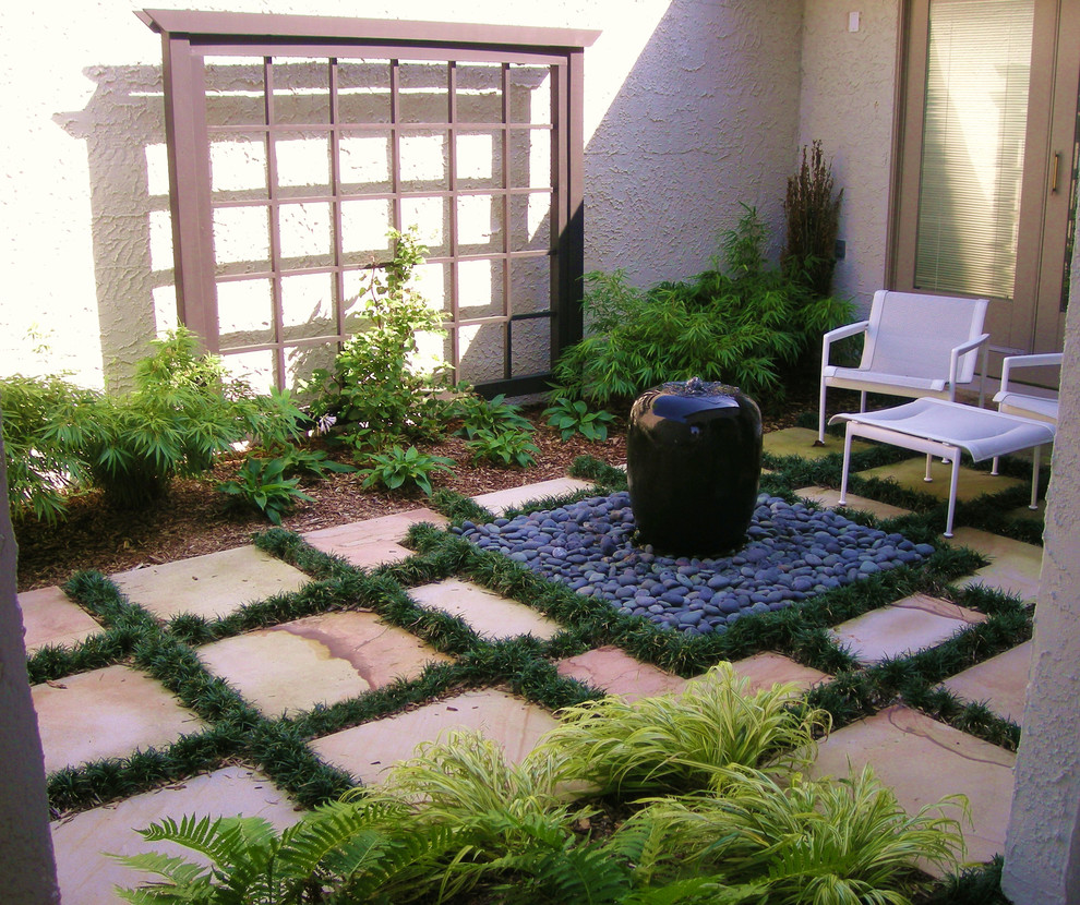 Example of a zen patio design in Newark