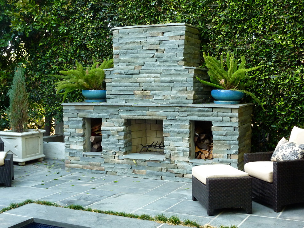 Photo of a traditional patio in Other with a fire feature and no cover.