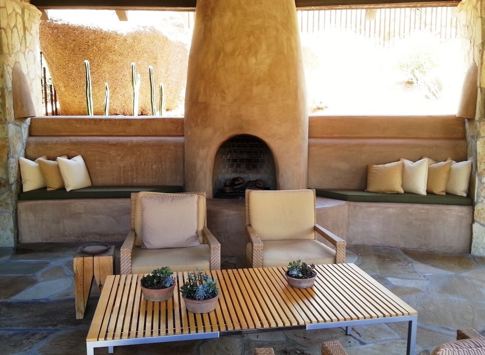 Design ideas for a patio in Phoenix with a fire feature.