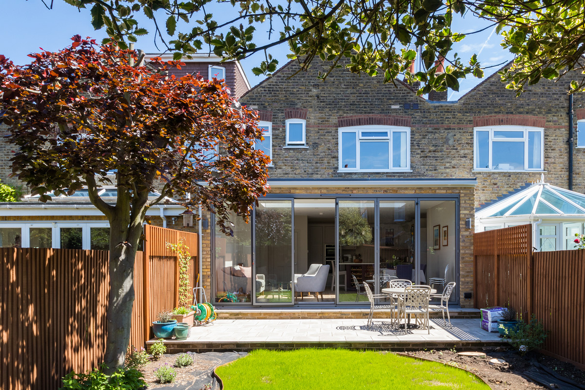 Design ideas for a medium sized contemporary patio in Surrey.