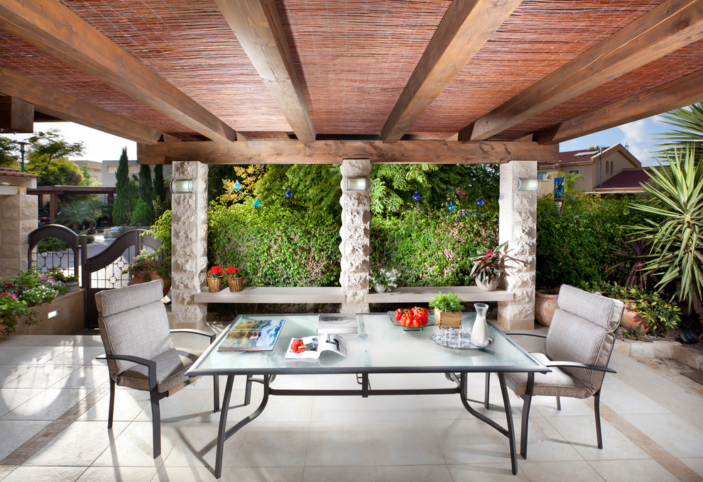 Inspiration for a world-inspired patio in Other with a gazebo.