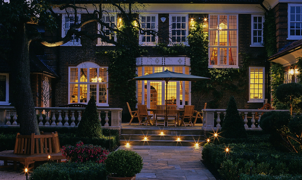 Inspiration for a classic patio in Surrey with no cover.