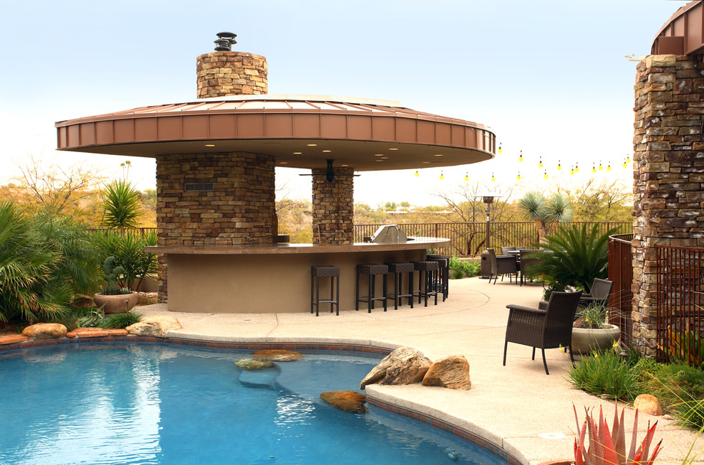 Contemporary patio in Phoenix with a gazebo and a bar area.