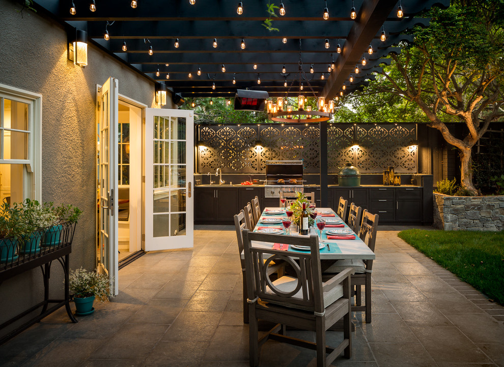 Example of a classic backyard patio kitchen design in San Francisco with a pergola