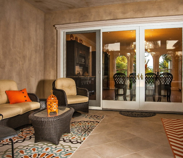 Exterior Renovation with Enclosed Patio and Pergola Classique