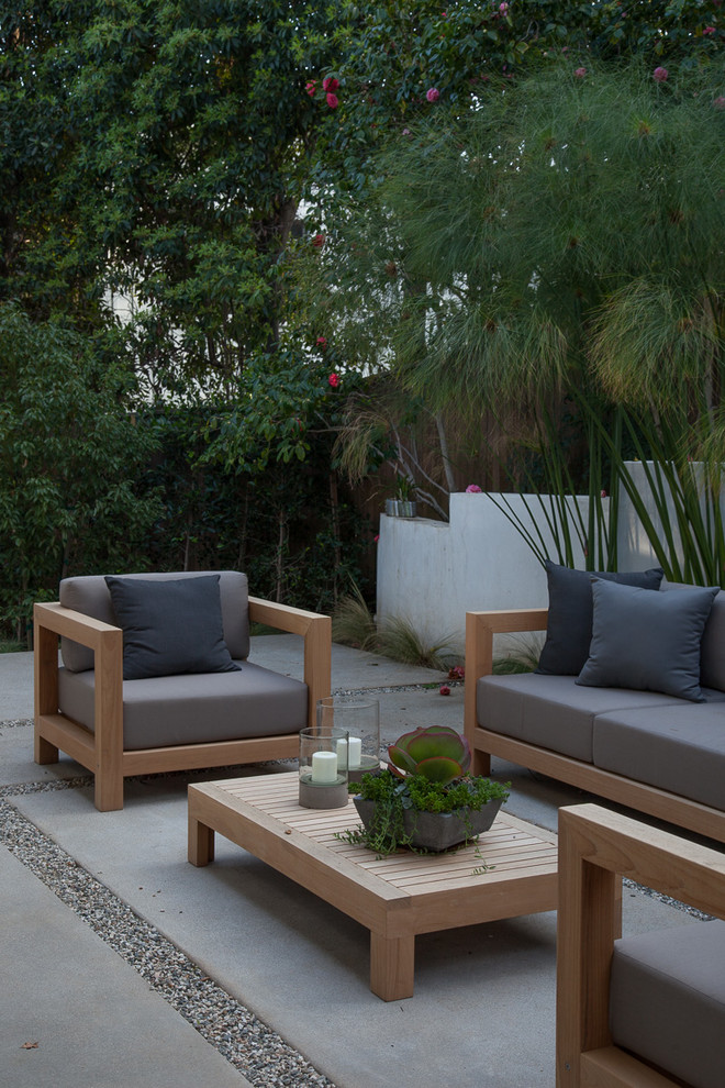 Foto di un patio o portico minimalista dietro casa