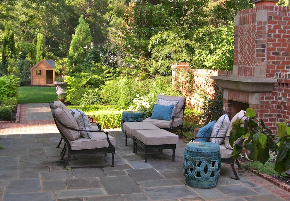 Classic patio in Charlotte with a fire feature.
