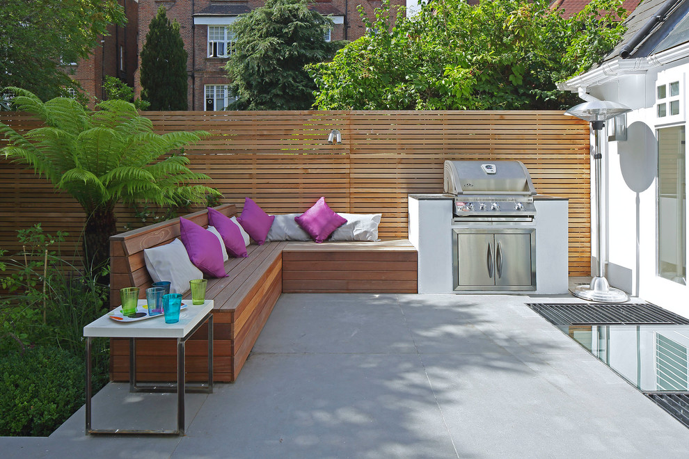 Inspiration for a contemporary patio in London with a bbq area.