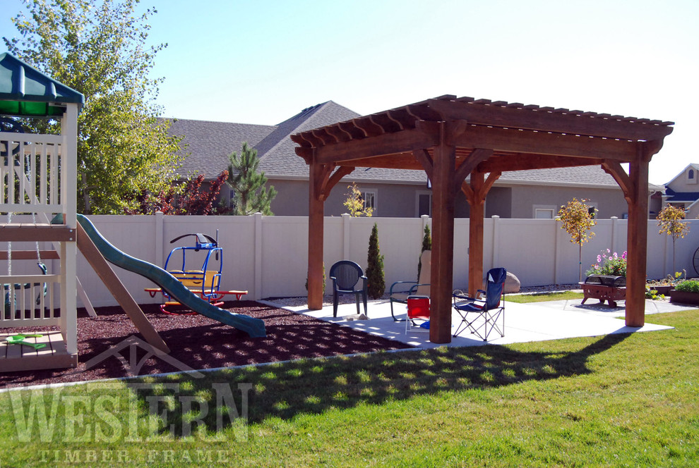 Inspiration for a timeless patio remodel in Salt Lake City with a pergola
