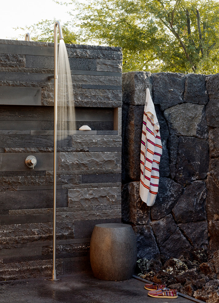 Example of an island style outdoor patio shower design in Hawaii