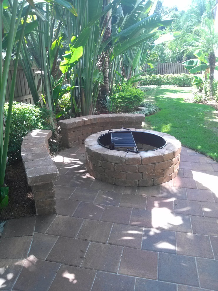 Patio - tropical patio idea in Tampa