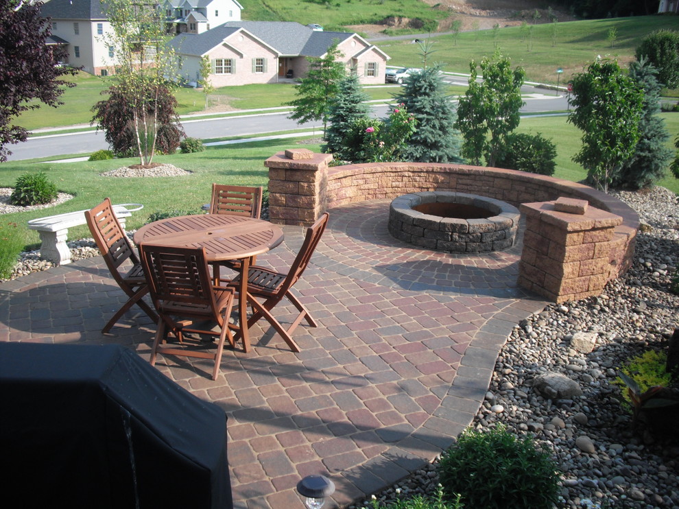 Mid-sized elegant backyard patio photo in Other