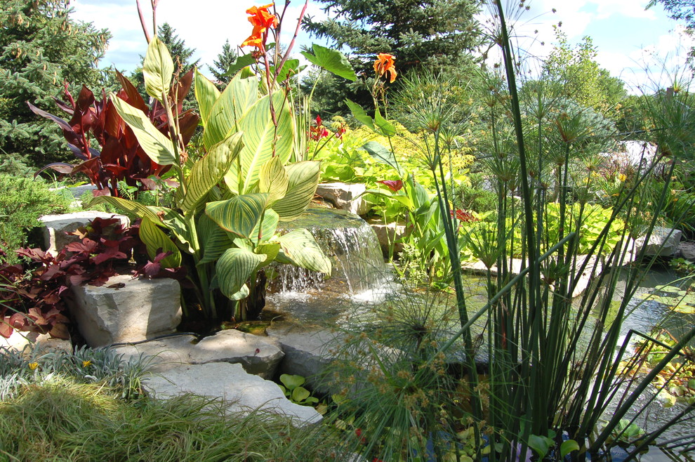 Fire pit & pond Traditional Patio Minneapolis by Daryl Melquist