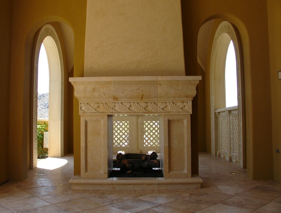 Design ideas for a large mediterranean back patio in Phoenix with a fire feature, tiled flooring and a roof extension.