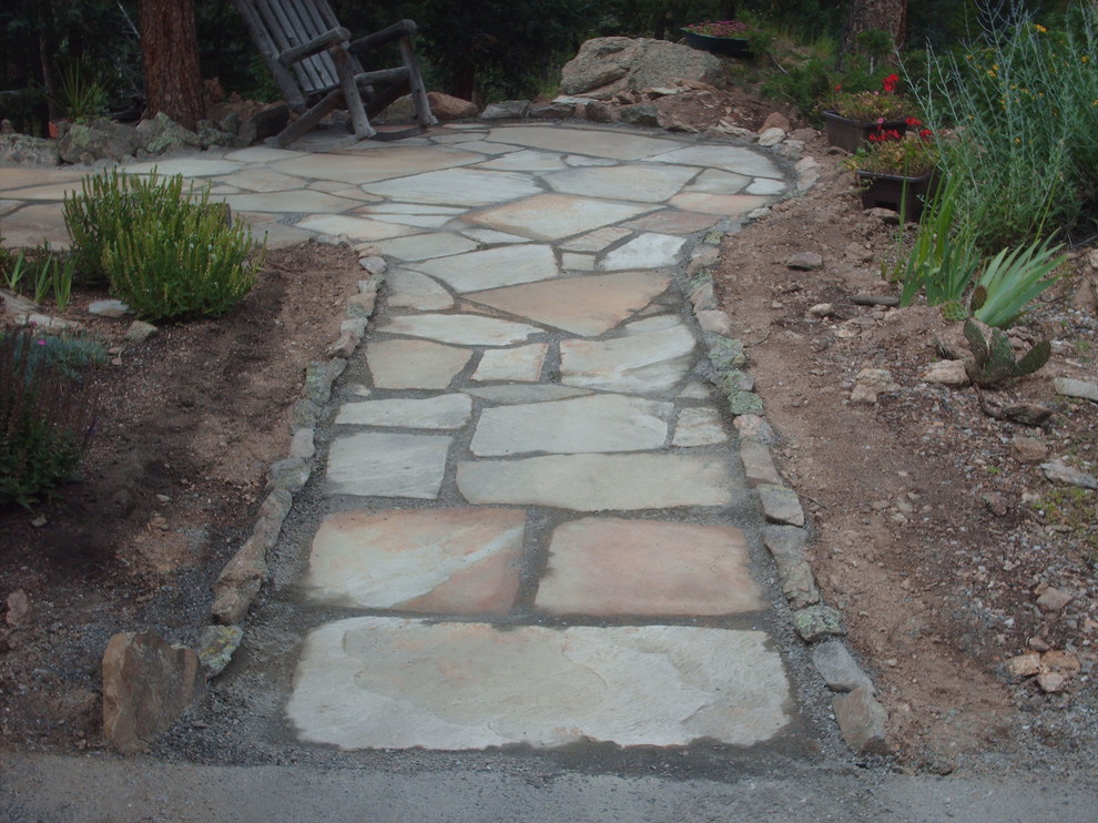Flagstone patio in Kittredge, Colorado. By Mountaineer Landscaping and Painting Traditional