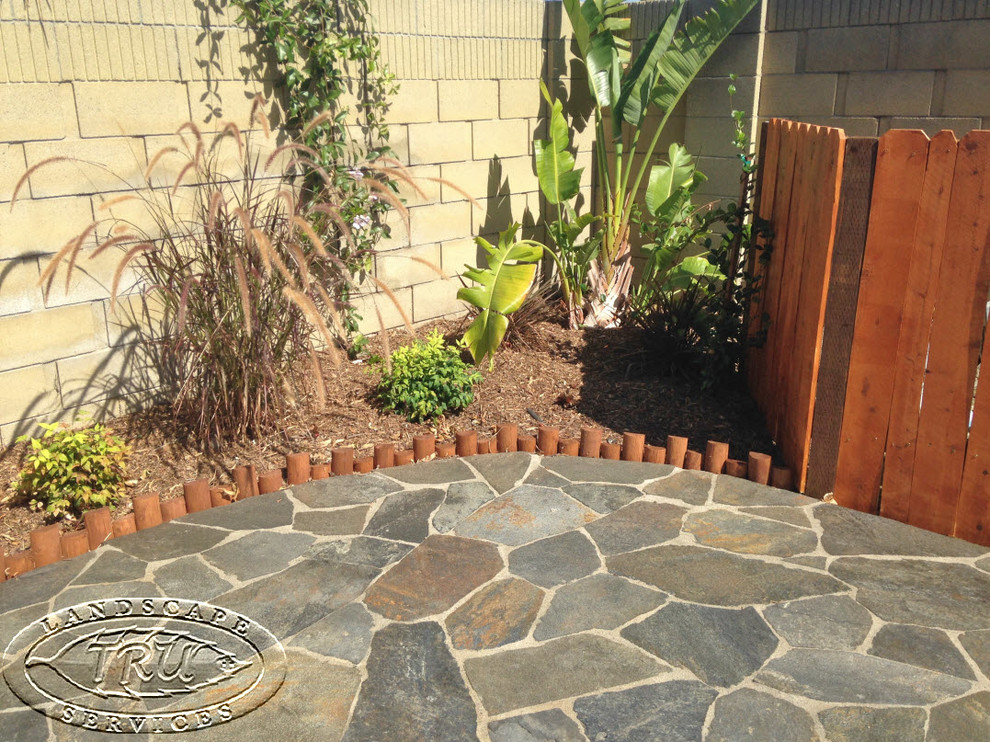 Flagstone Patio Seal Beach Tropical Patio Orange County by TRU