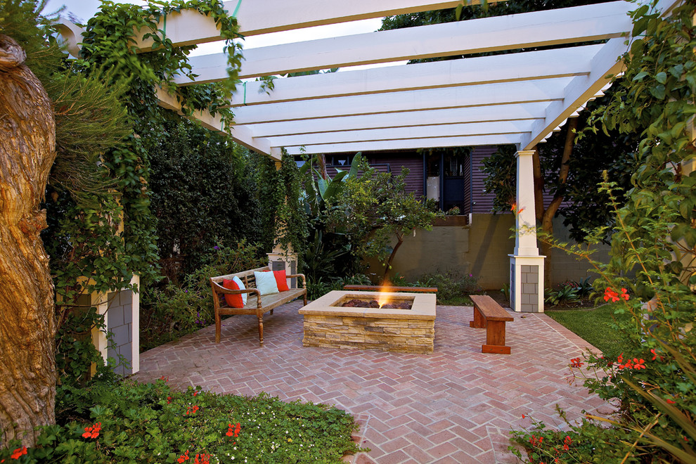 Patio - traditional patio idea in San Diego with a pergola