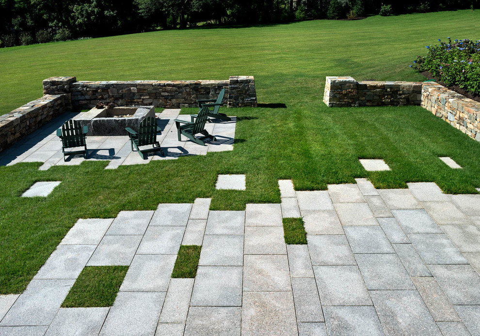 Example of a beach style patio design in Portland Maine