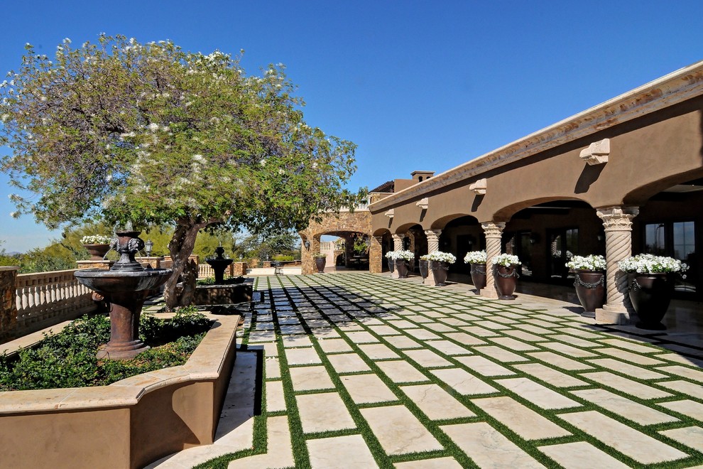Design ideas for a mediterranean patio in Phoenix.