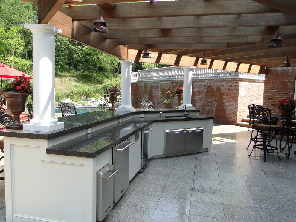 Patio kitchen - large contemporary backyard patio kitchen idea in Philadelphia with decking and a pergola