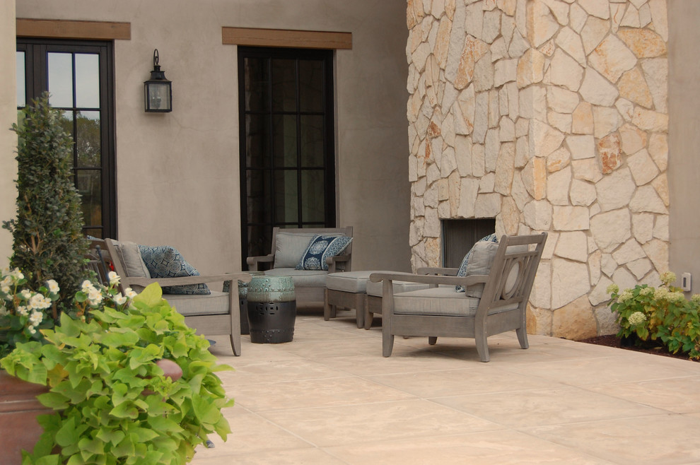 Example of a french country patio design in Other
