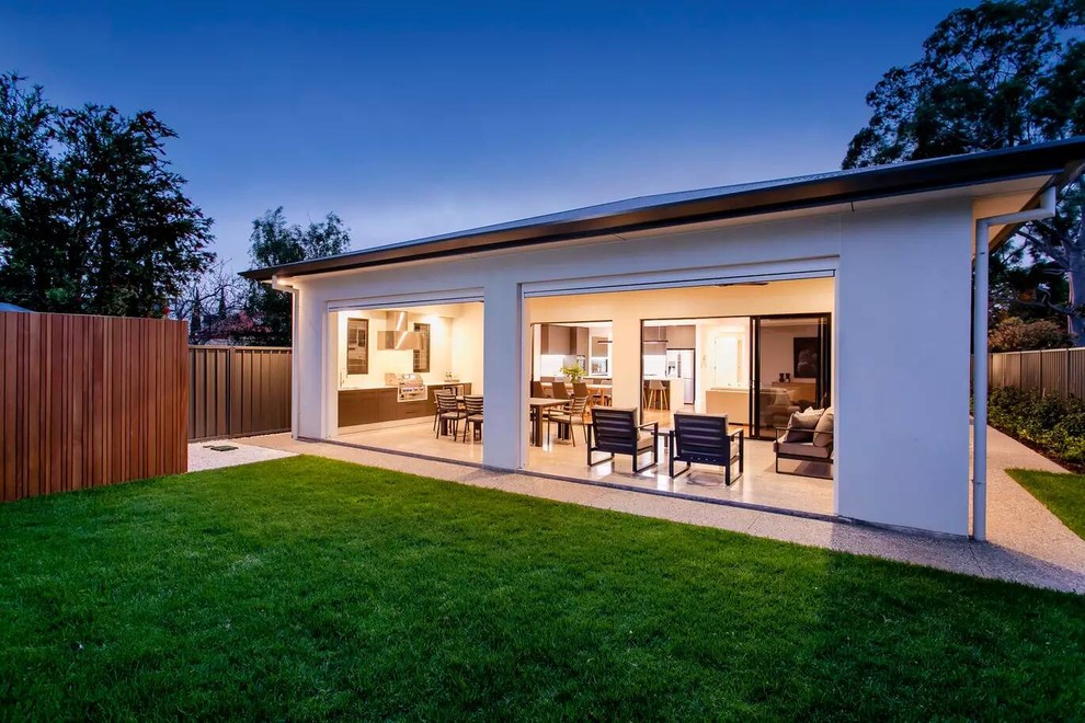 Contemporary back patio in Adelaide with an outdoor kitchen and a roof extension.
