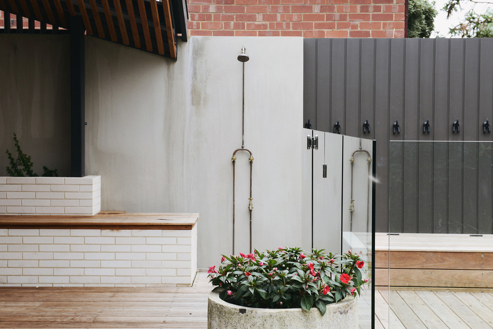 Photo of a scandi back patio in Melbourne with an outdoor shower and decking.