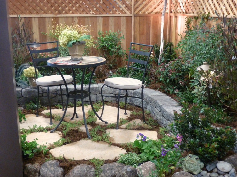 Design ideas for a medium sized contemporary back patio in San Francisco with natural stone paving and no cover.