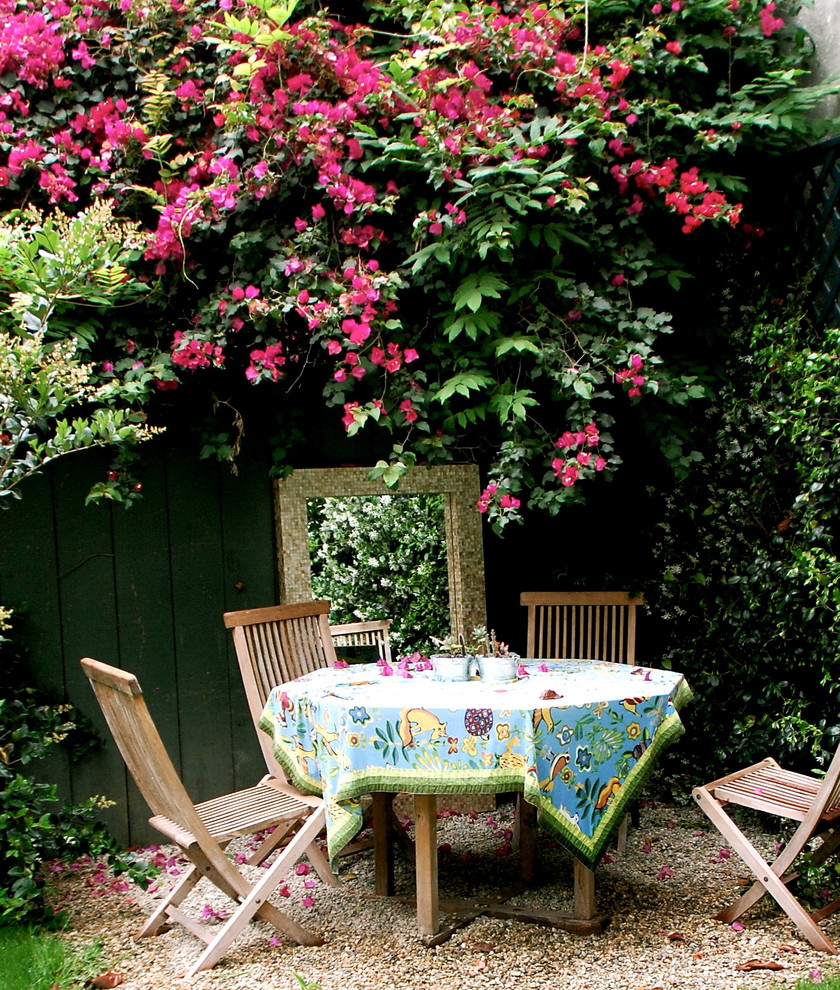 Example of a cottage chic patio design in Los Angeles with no cover