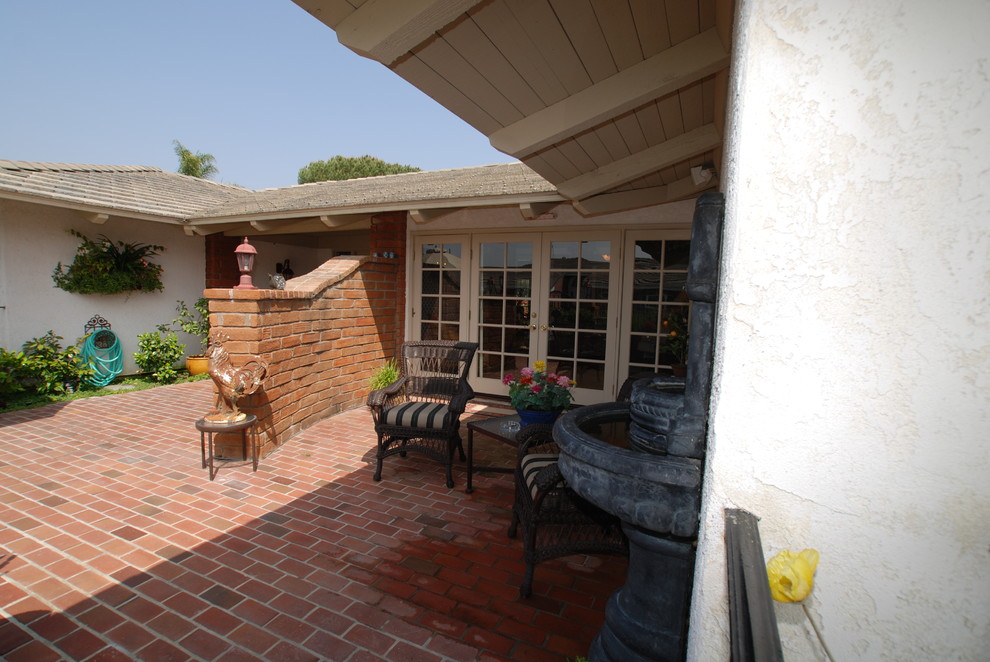 Garden Sunroom With Trompel'oeil Painting Walls & Trellis Over Mirror Midcentury Patio