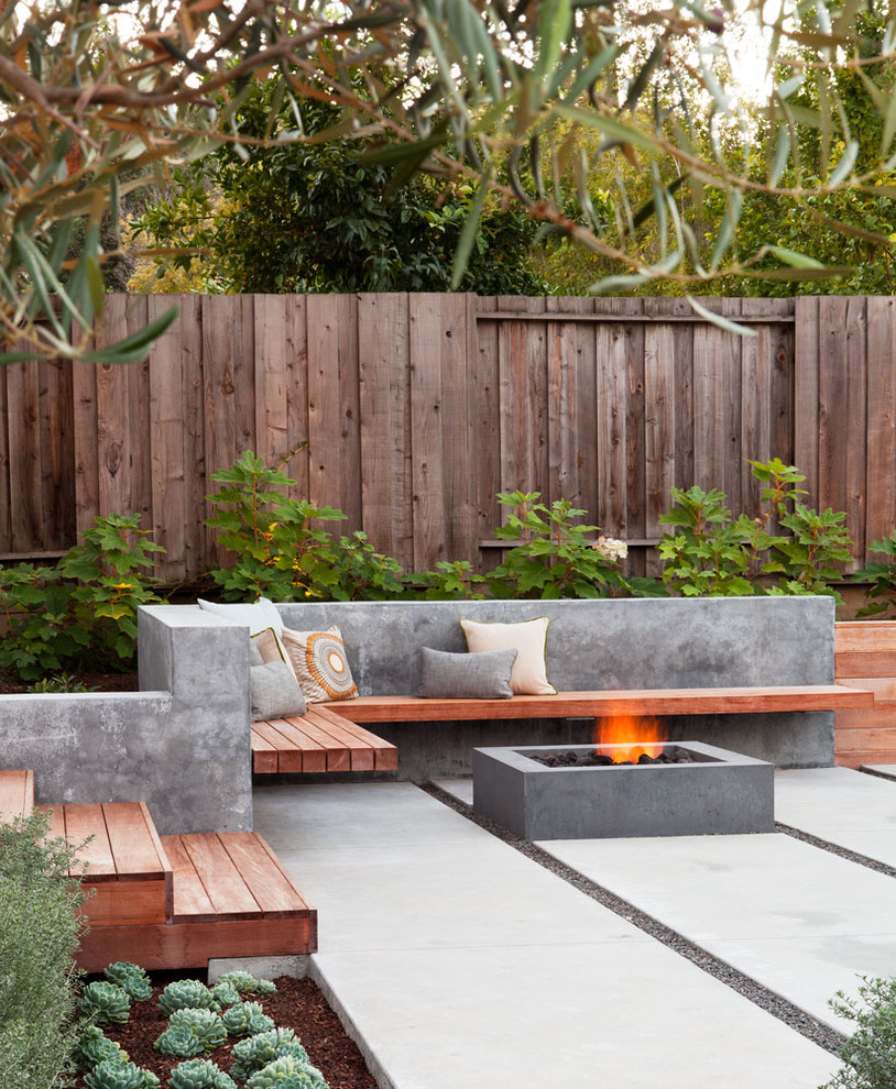 Inspiration for a contemporary backyard patio remodel in San Francisco with a fire pit