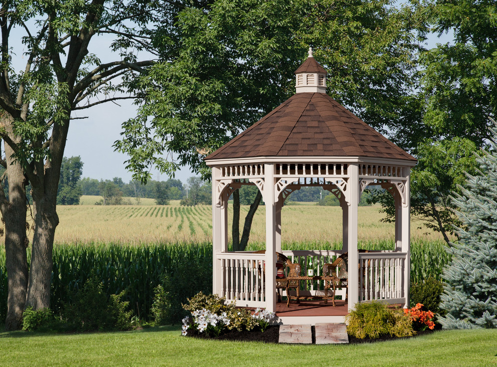 Inspiration for a victorian patio remodel in Other with a gazebo