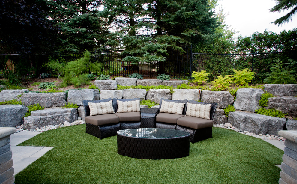 Large trendy backyard patio photo in Toronto with no cover