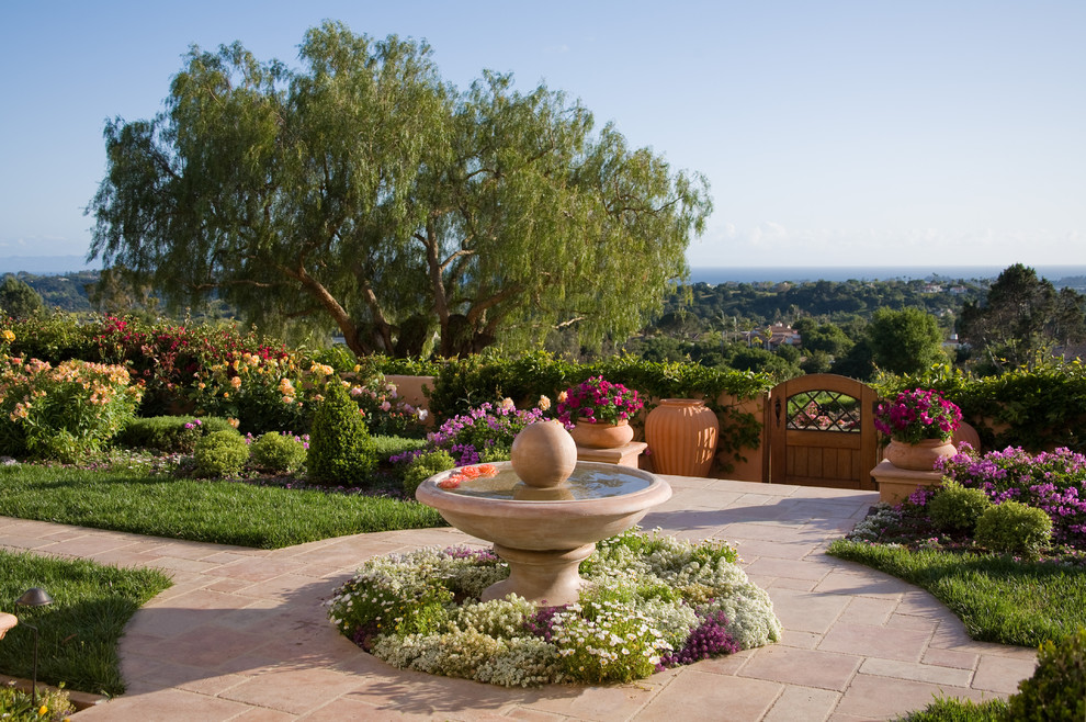 Photo of a classic patio in Santa Barbara with a water feature.