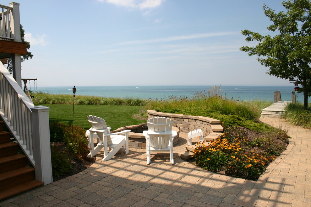 Example of a beach style patio design in Chicago