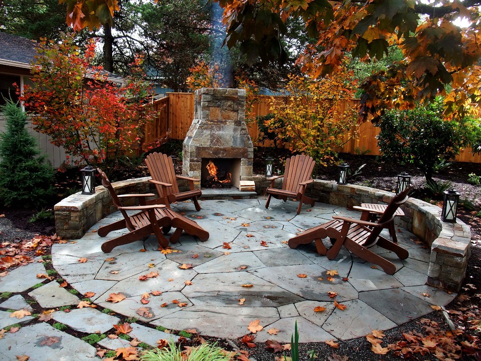 Inspiration for a timeless patio remodel in Portland with a fire pit