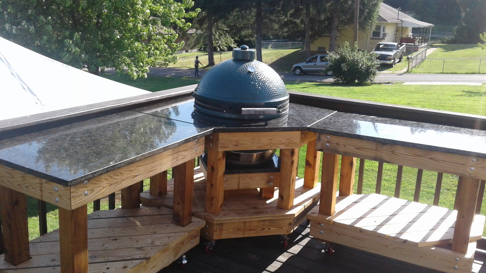 Example of a classic backyard patio kitchen design in Baltimore