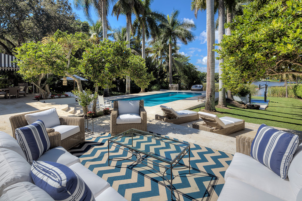 Photo of a world-inspired patio in Miami with no cover.