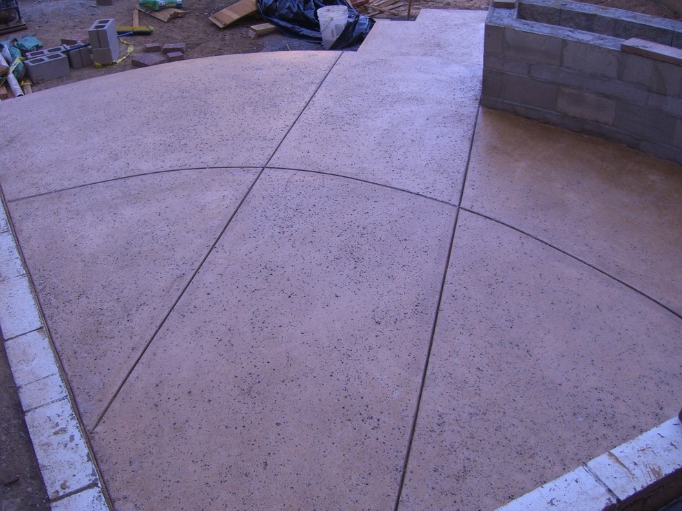 Traditional back patio in San Francisco with concrete slabs.