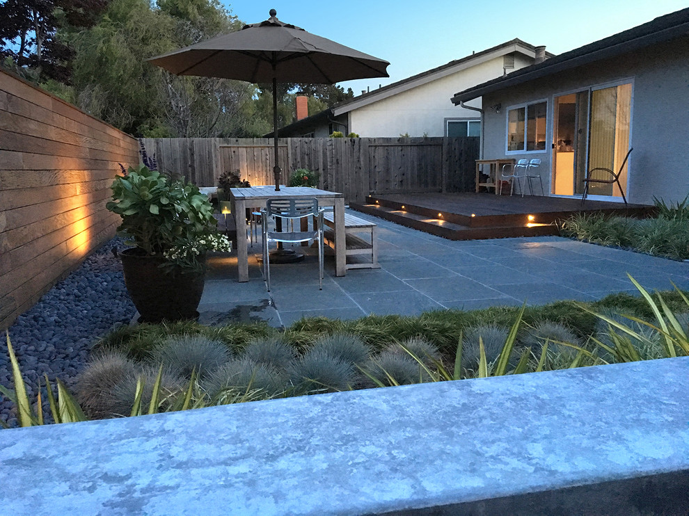 Design ideas for a medium sized classic back patio in San Francisco with natural stone paving and no cover.