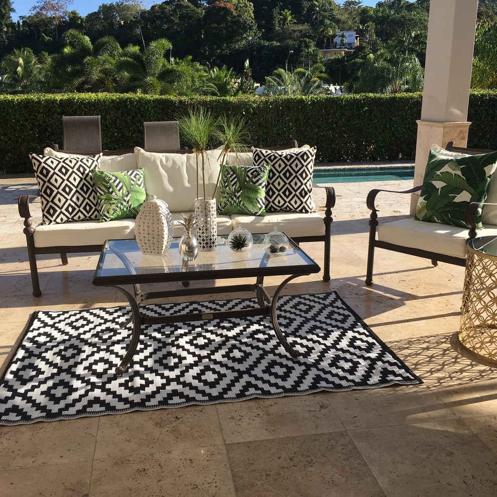 Inspiration for a tropical backyard tile patio remodel in Hawaii