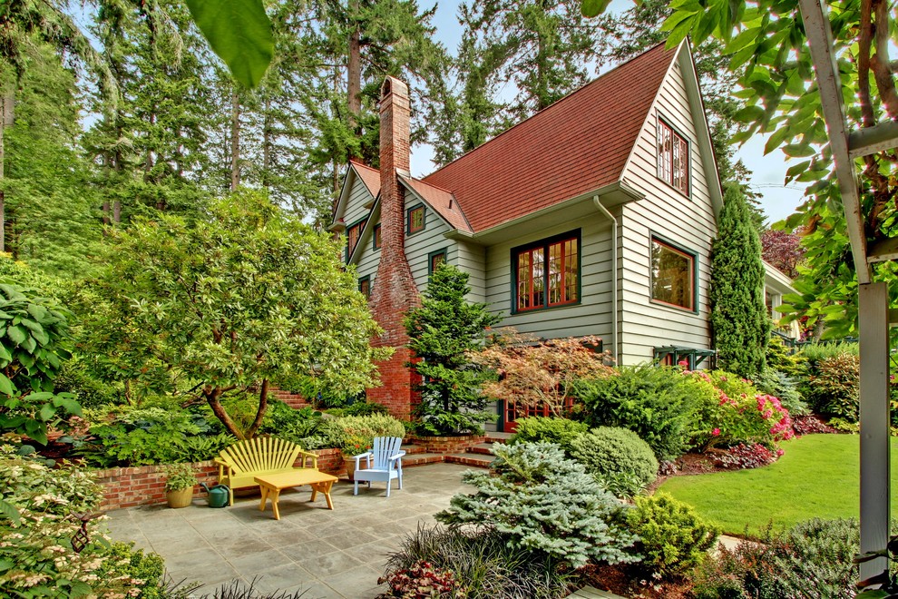 Design ideas for a large farmhouse patio in Seattle.