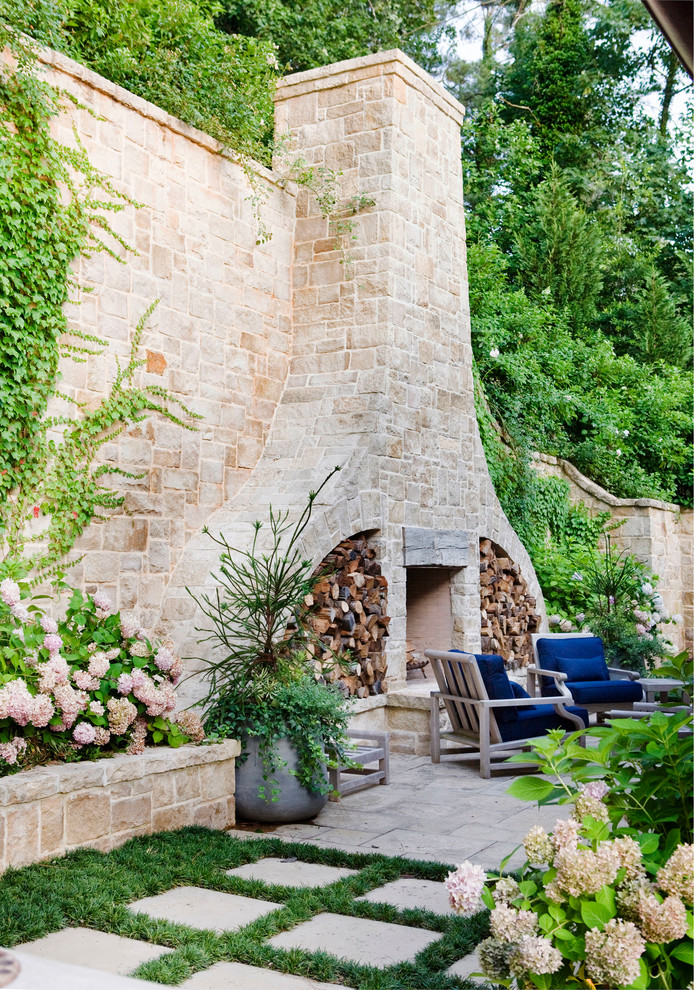 Traditional patio in Atlanta with a fire feature.