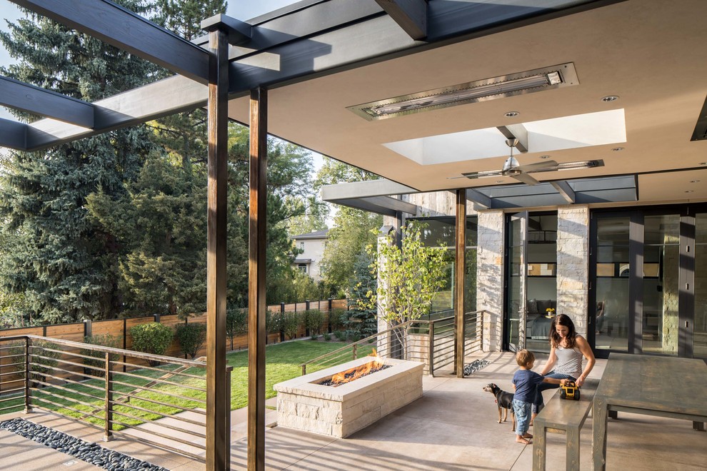 Patio - modern backyard patio idea in Denver
