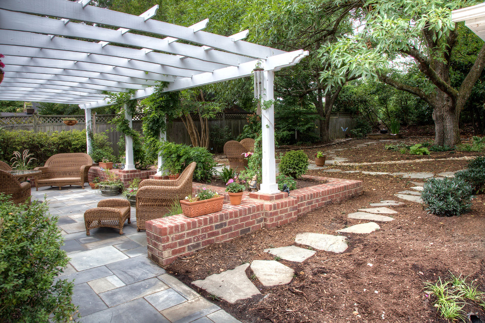 Inspiration for a farmhouse patio remodel in Raleigh