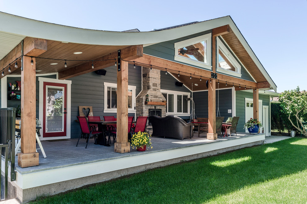 Inspiration for a medium sized traditional back patio in Vancouver with a roof extension.