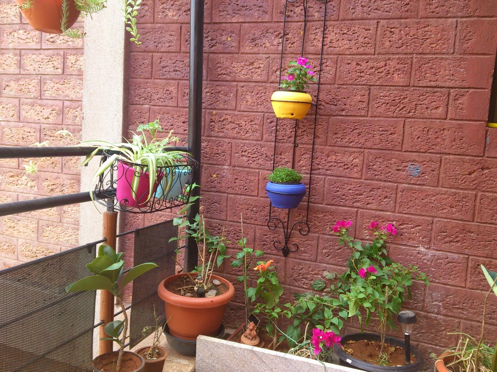Design ideas for an eclectic patio in Bengaluru.