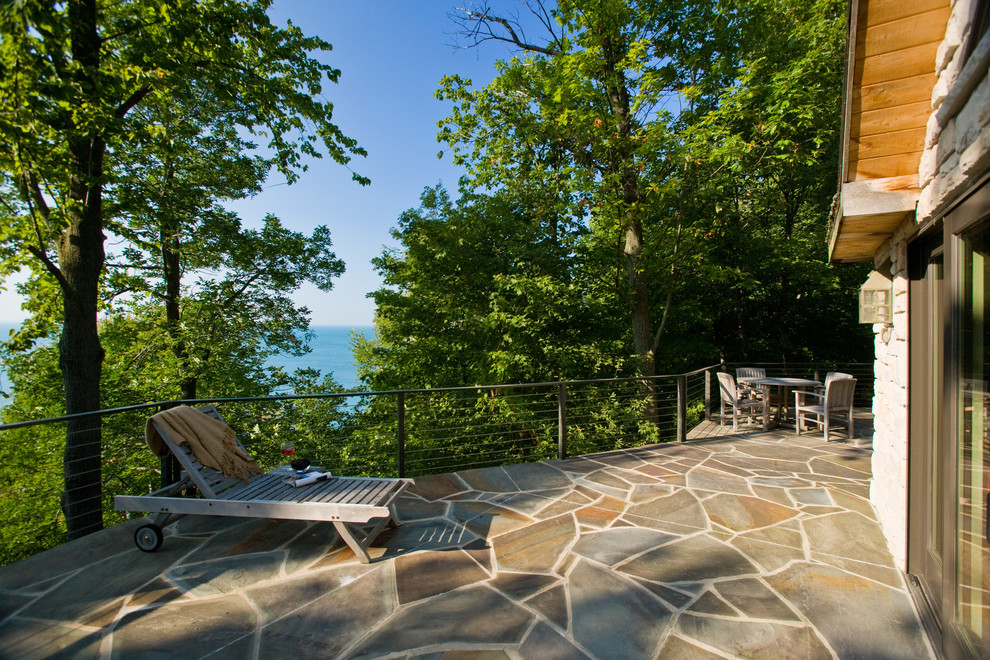 Example of a mountain style patio design in Other